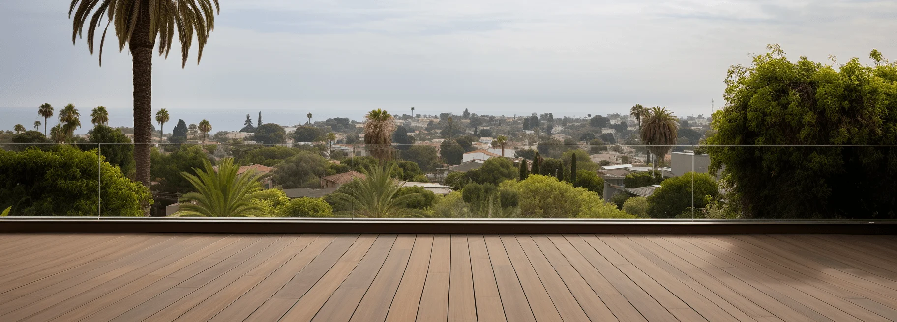 Tan composite wood deck on modern home