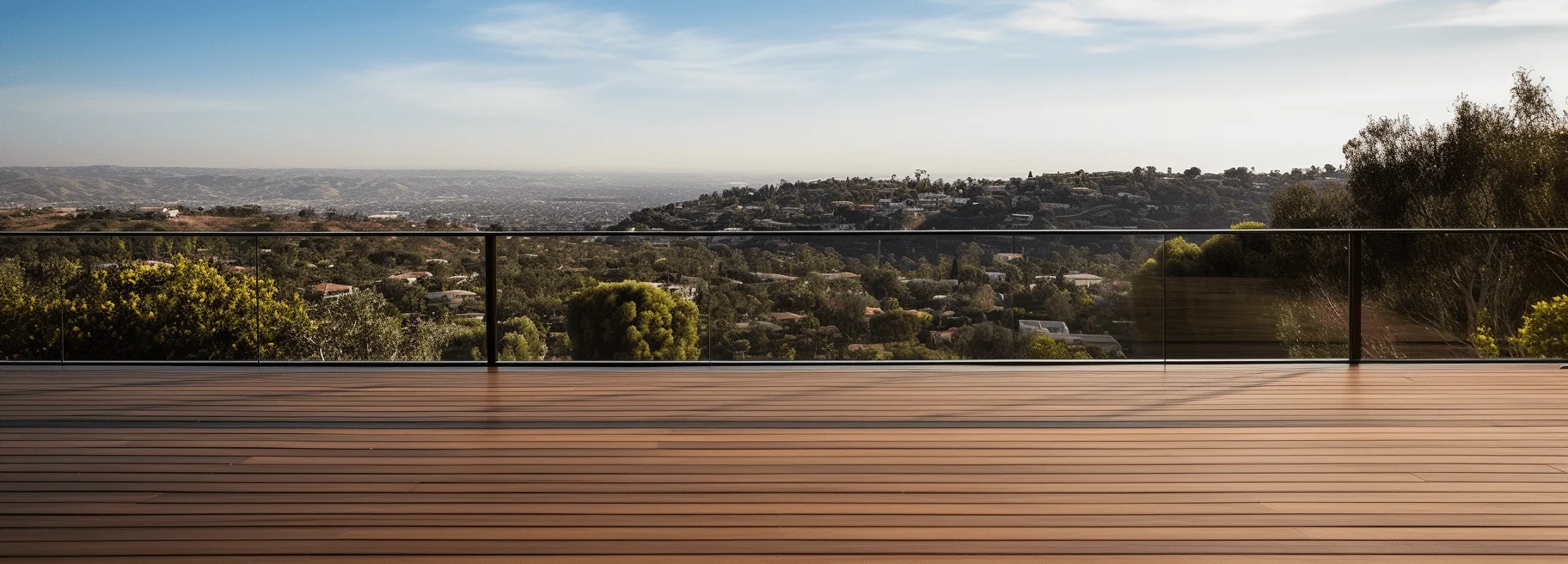 Brown composite wood deck on modern home