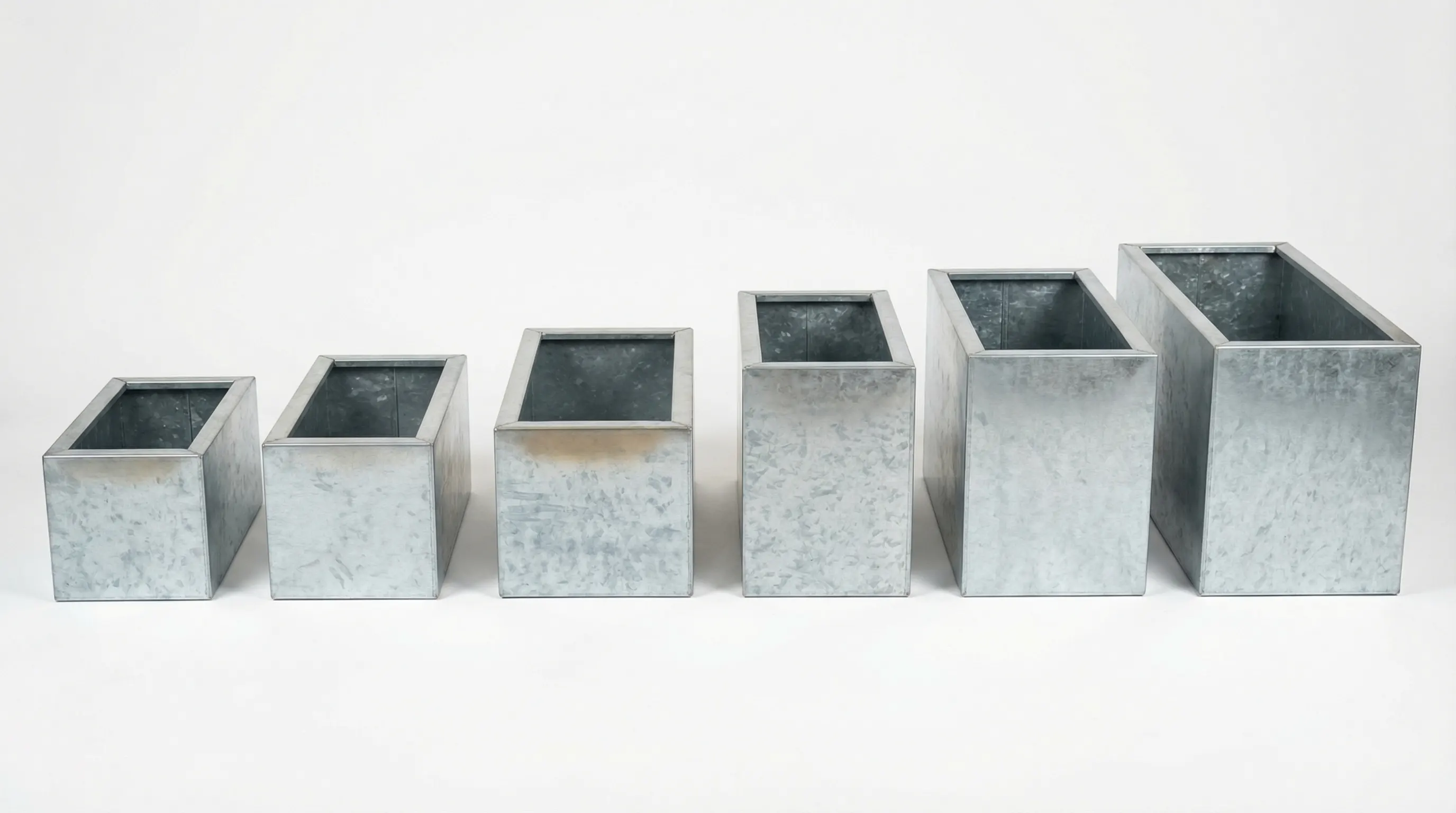 Six standard galvanized steel planter models arranged smallest to largest